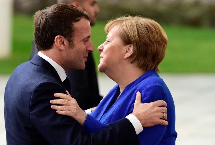 Merkel'den Macron'a samimi karşılama! 5