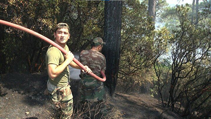 Felaket bölgesinde 'Gardaş' desteği: Alevlerin arasına daldılar! 6