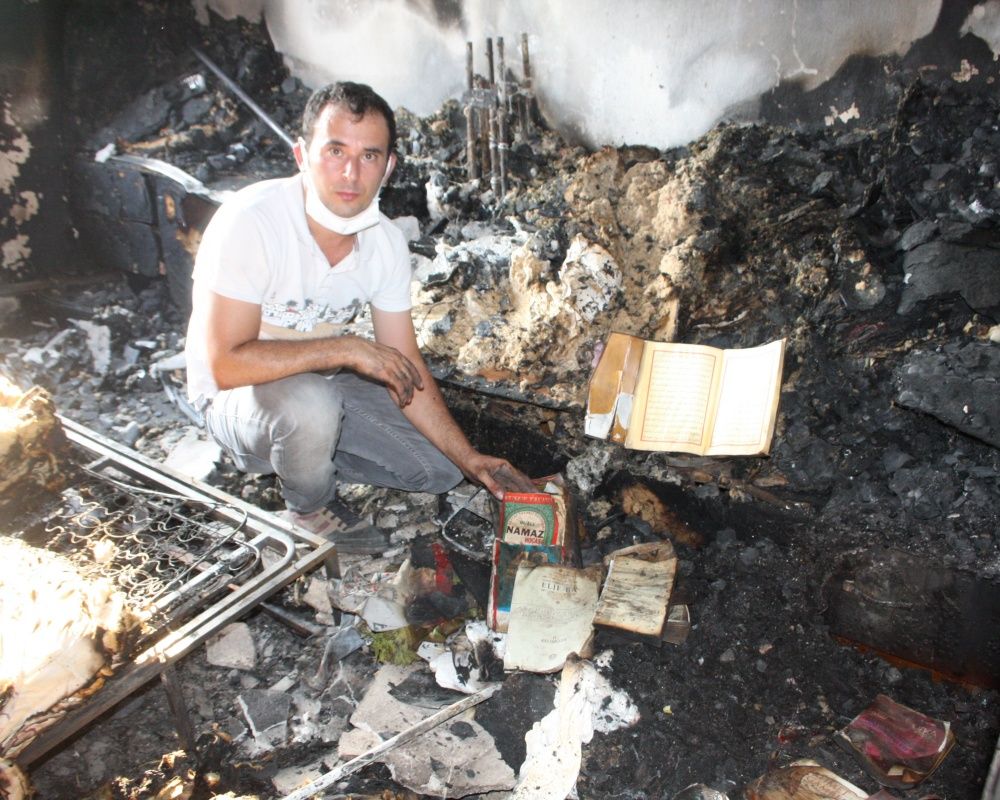 Manavgat'taki yangında küle dönen evdeki Kur'an-ı Kerimler zarar görmedi 11