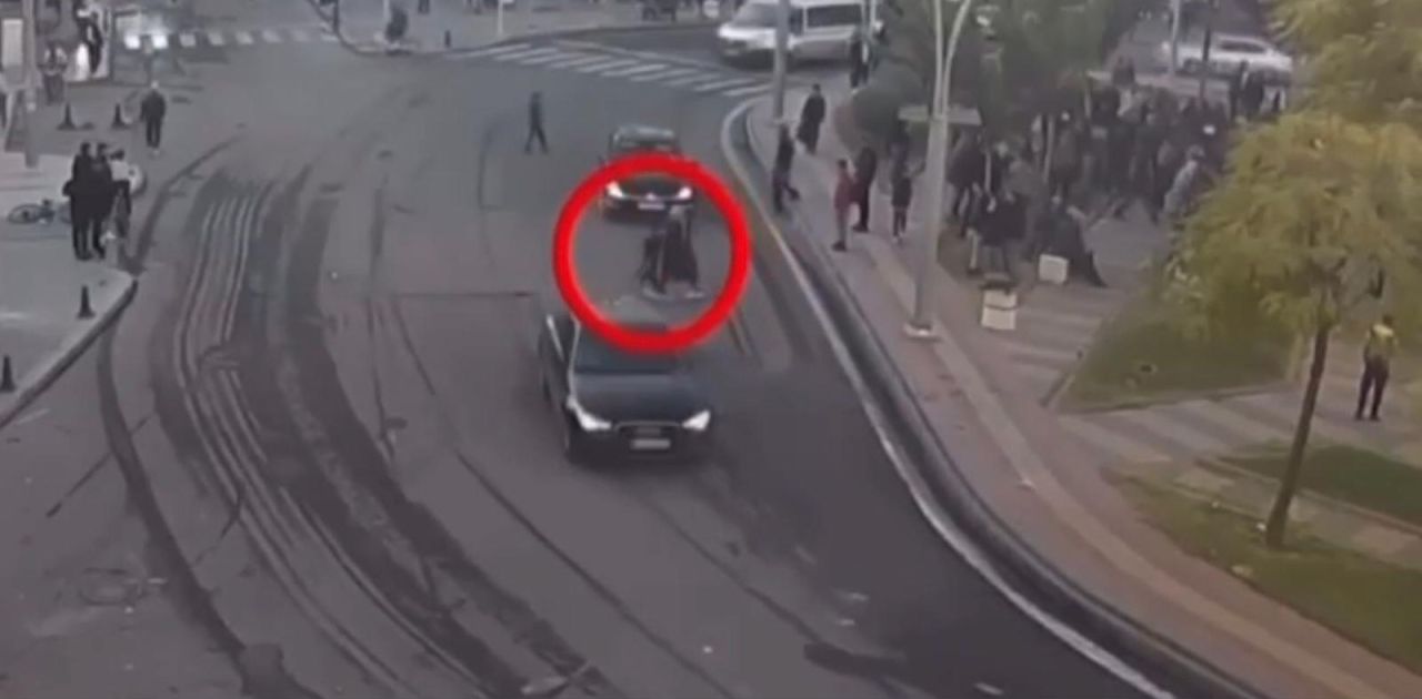 Çocuğunu PKK yandaşlarının arasından çekip çıkaran anne! Saniye saniye kamerada... 2