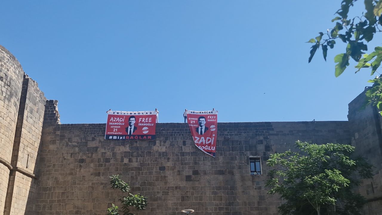 Diyarbakır surlarına asılan 'İmamoğlu' pankartlarına polis el koydu, CHP'li başkana ceza kesildi 6