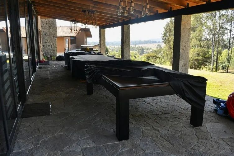 Baronun 'mütevazı' sığınağı! El Mencho'nun öldürüldüğü villadan şok görüntüler: Aziz heykelleri ve ilaç dolapları dikkat çekti 13