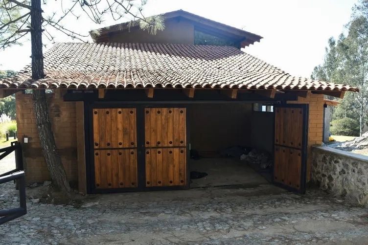Baronun 'mütevazı' sığınağı! El Mencho'nun öldürüldüğü villadan şok görüntüler: Aziz heykelleri ve ilaç dolapları dikkat çekti 14