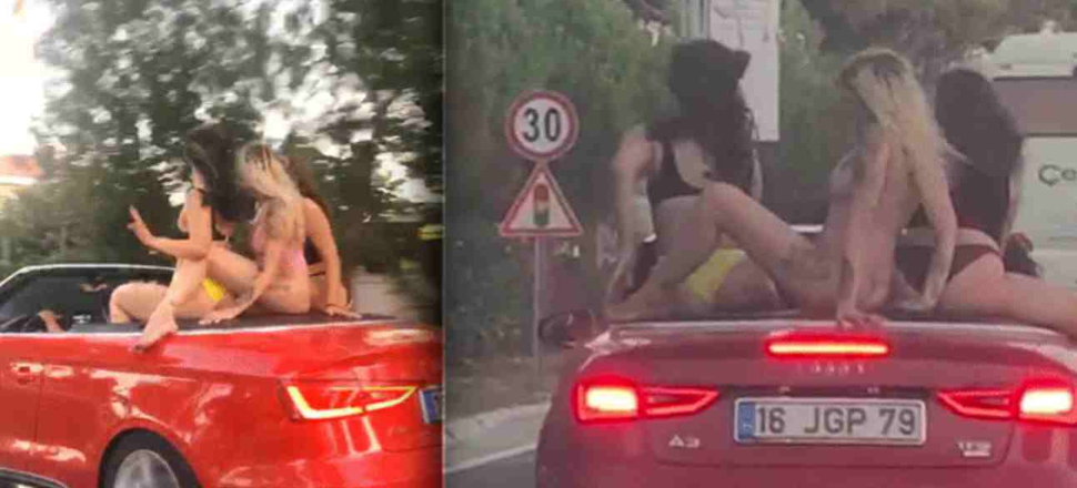 Araba üzerinde bikinili dansa polis müdahale etti!