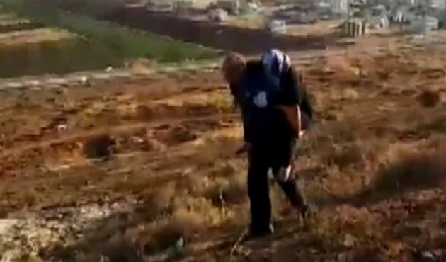 Yaralı Suriyeli kadını 2 kilometre sırtında taşıdı