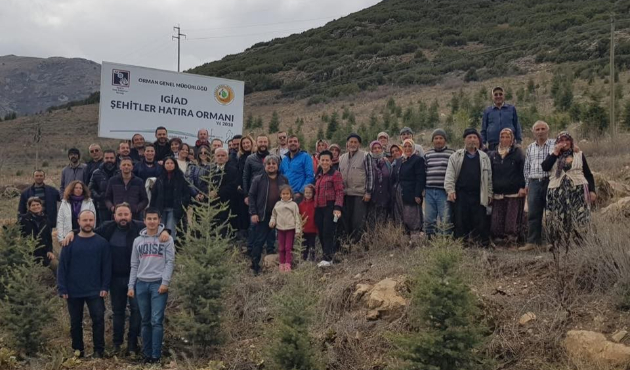 Şehitlerin adını taşıyan fidanlar toprakla buluştu