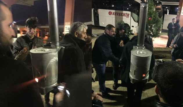 Sırtına odun sobasını bağlayıp otogarda gezdi