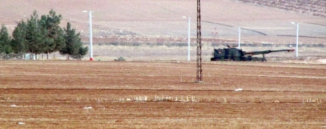 Obüsler DAEŞ'i vururken zırhlı araçlar Suriye'ye girdi!