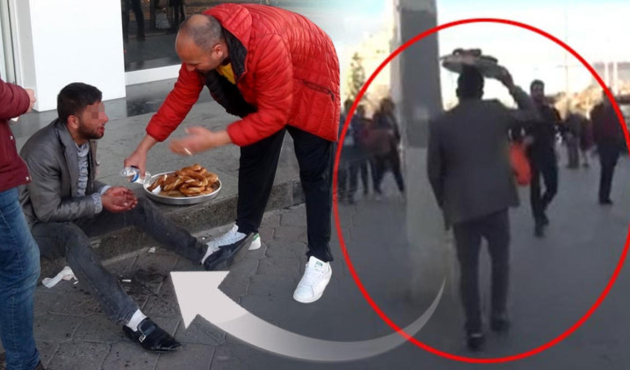 Taksim'de ağzında kan torbasıyla bir simitçi!