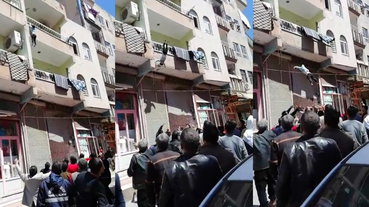 Balkondan düşen çocuğu böyle yakaladılar...