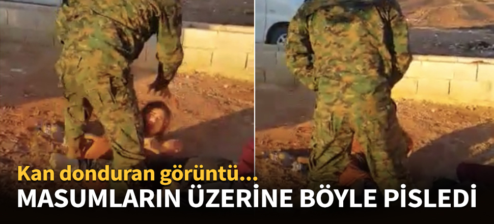 YPG'li terörist masumların üzerine böyle pisledi!