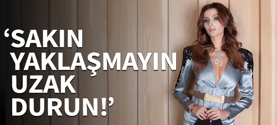 Özge Ulusoy korumalarıyla geziyor!