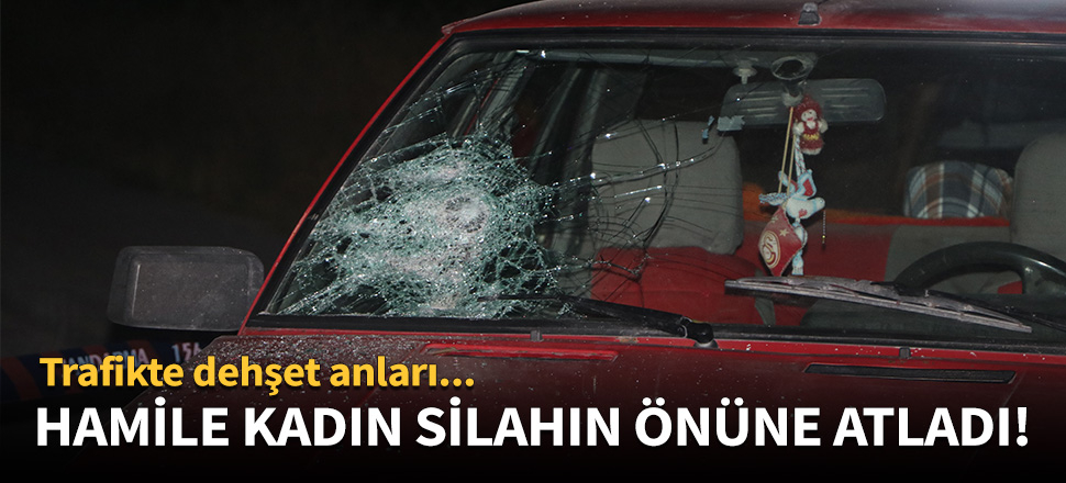 Hamile kadın silahın önüne atladı!