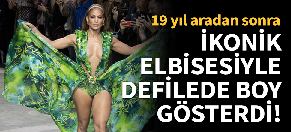 İkonik elbisesiyle defilede boy gösterdi!