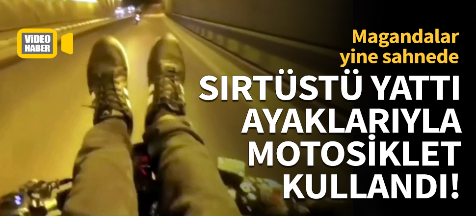 Sırtüstü yatıp ayaklarıyla motosikleti kontrol etti!