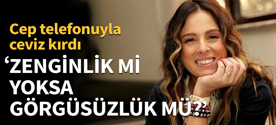 Son model telefonuyla ceviz kırdı!