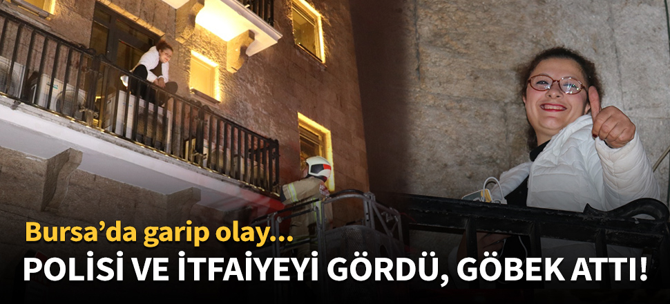 Balkonda mahsur kalan kadın polisi görünce göbek attı!