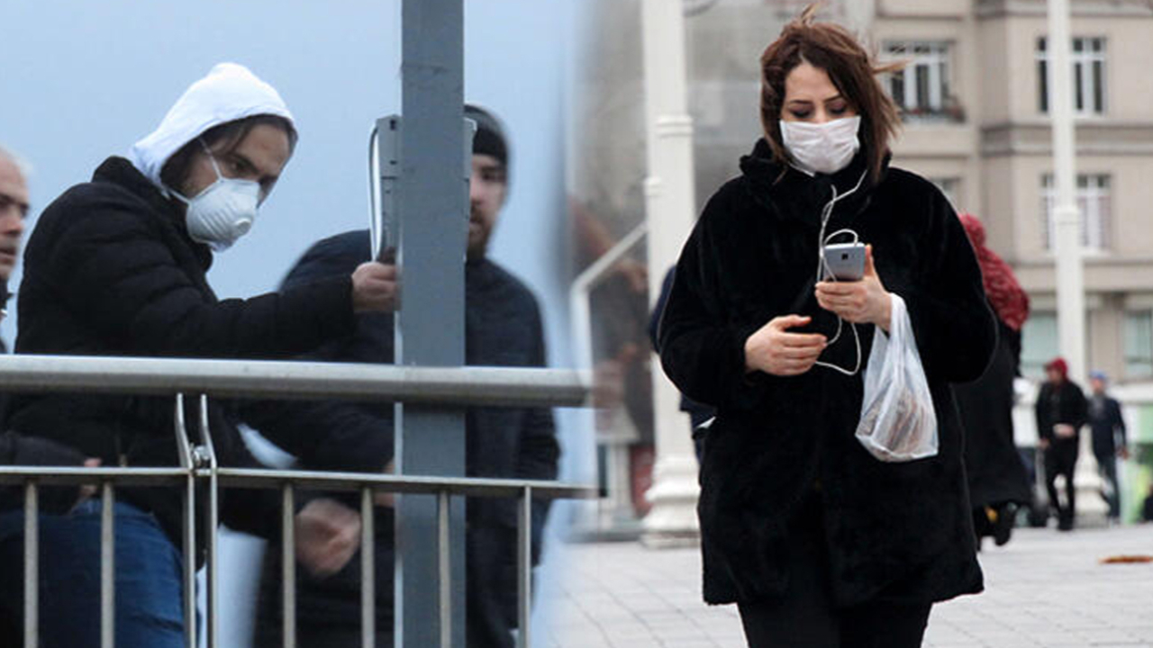 İstanbul'da vatandaşların maskeli ve eldivenli koronavirüs önlemi