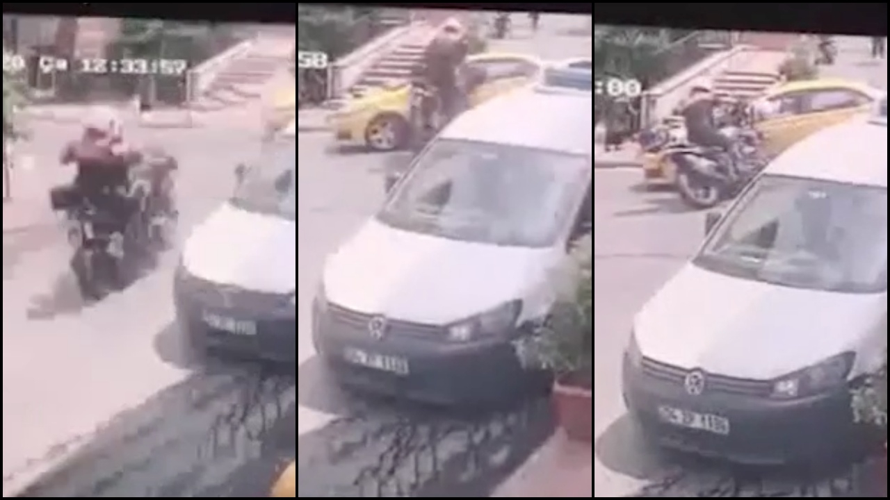 Taksici, motosikletten fırlayan polisi havada tuttu!