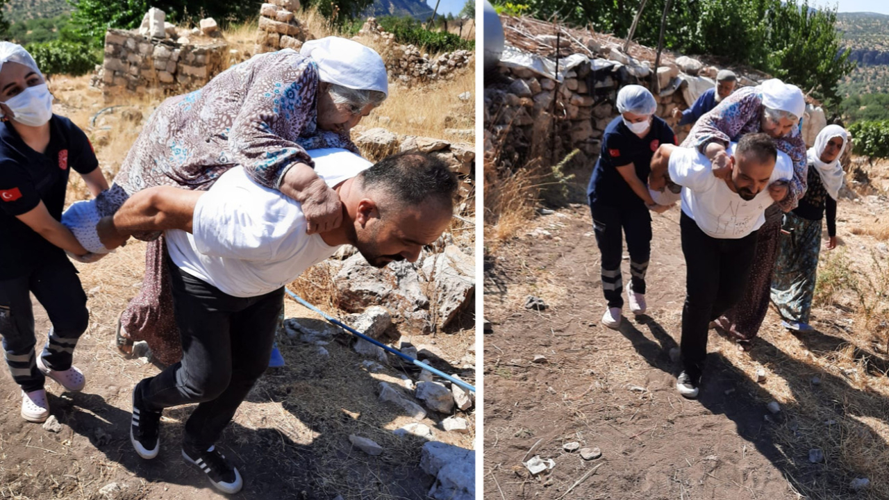 Ambulans şoförü 120 kilo ağırlığındaki hastayı 2 kilometre sırtında taşıdı
