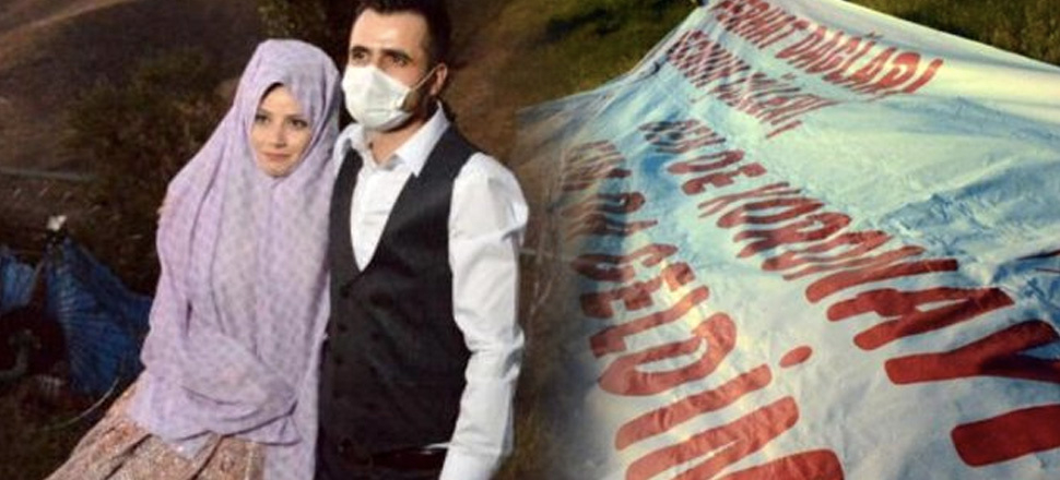 Pandemi nedeniyle düğünü iptal eden damat, eşine yazdığı pankartı yamaca astı!