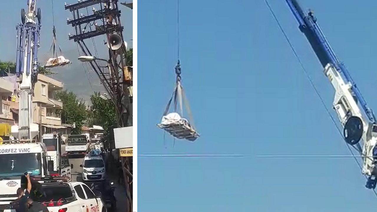 Evinde ölü bulunan adamın cesedi vinçle çıkartıldı!