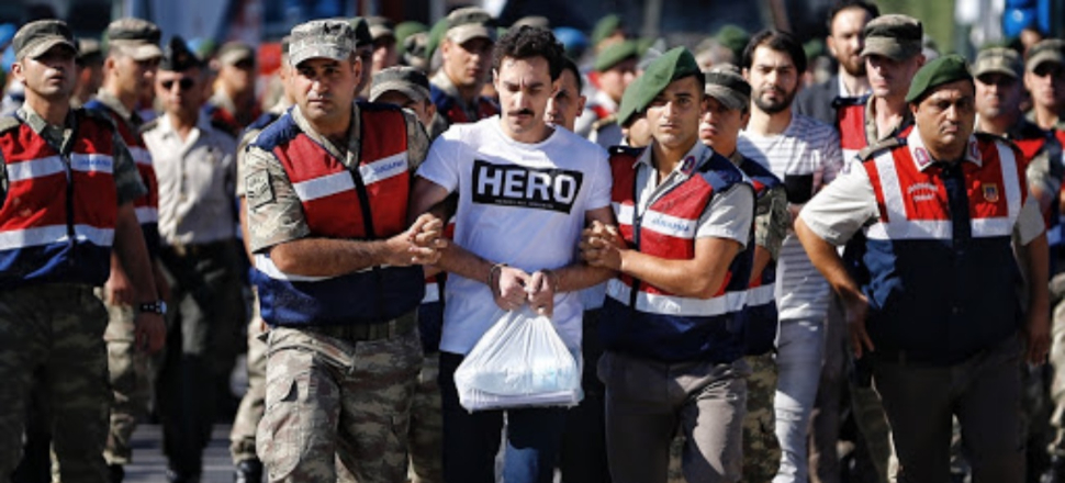 'Hero' tişörtlü FETÖ'cüye beraat