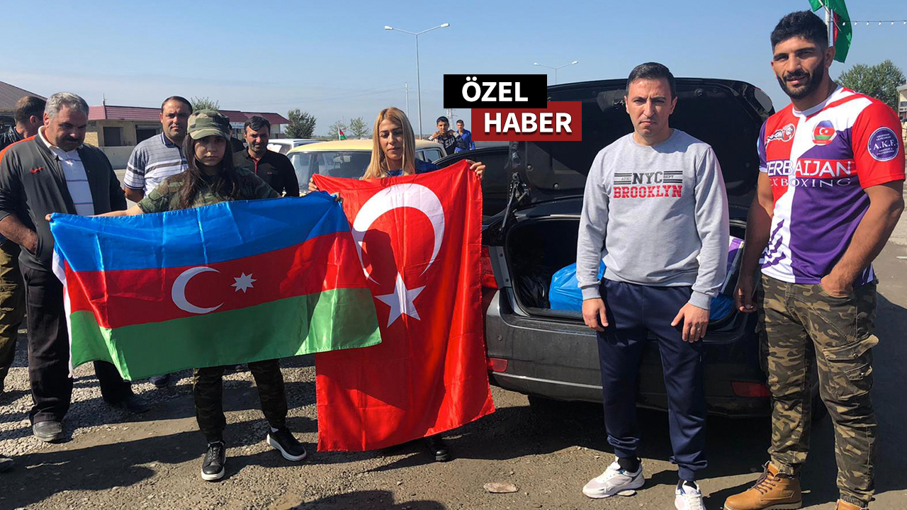 Dünya şampiyonu karı-koca cepheye erzak götürüyor