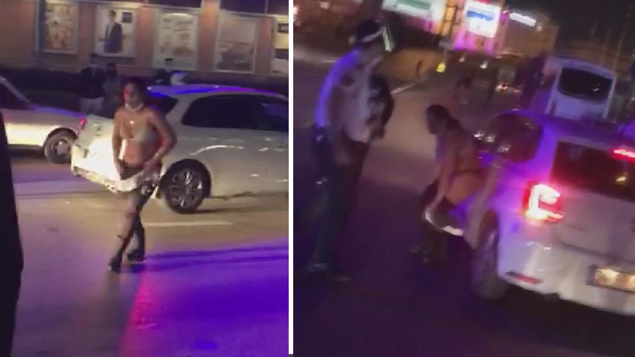 Gözaltına alınmamak için cadde ortasında soyundular!