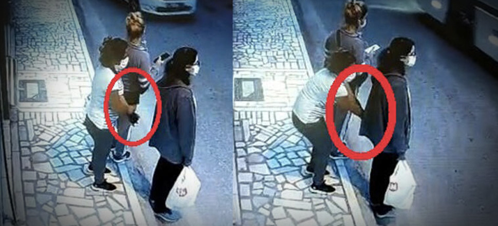 Durakta bekleyen kızın cep telefonunu çaldığı anlar kamerada!