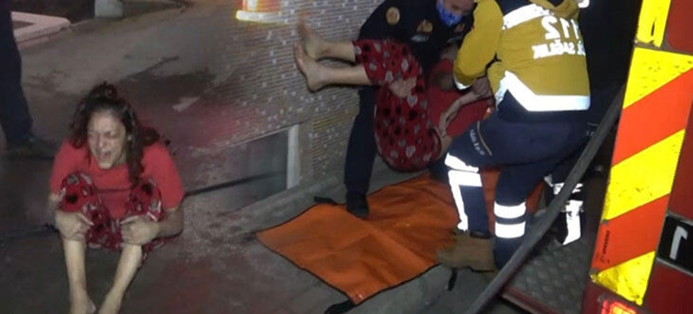 Yangın sırasında duşa girip, kendisini ıslatınca kurtuldu