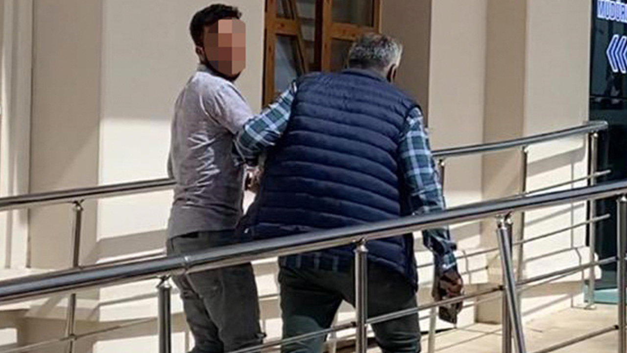 Kendisini görüntüleyen gazetecilere göyle bağırdı