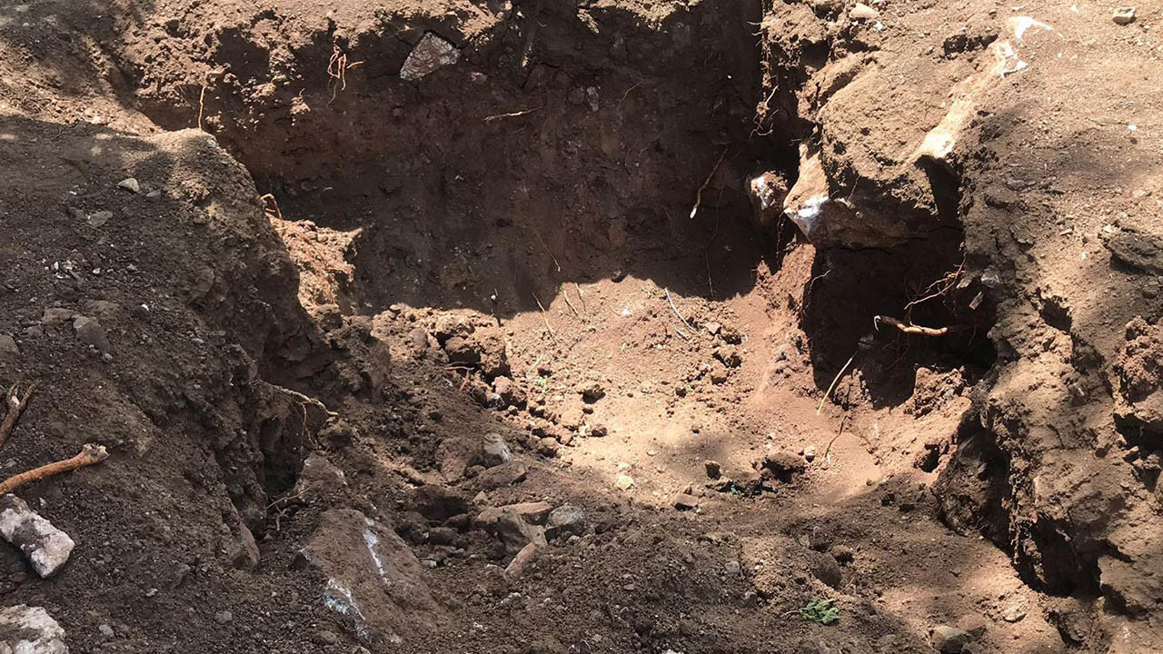 Adıyaman'da toprağa gömülü insan kafatası ve kemik bulundu