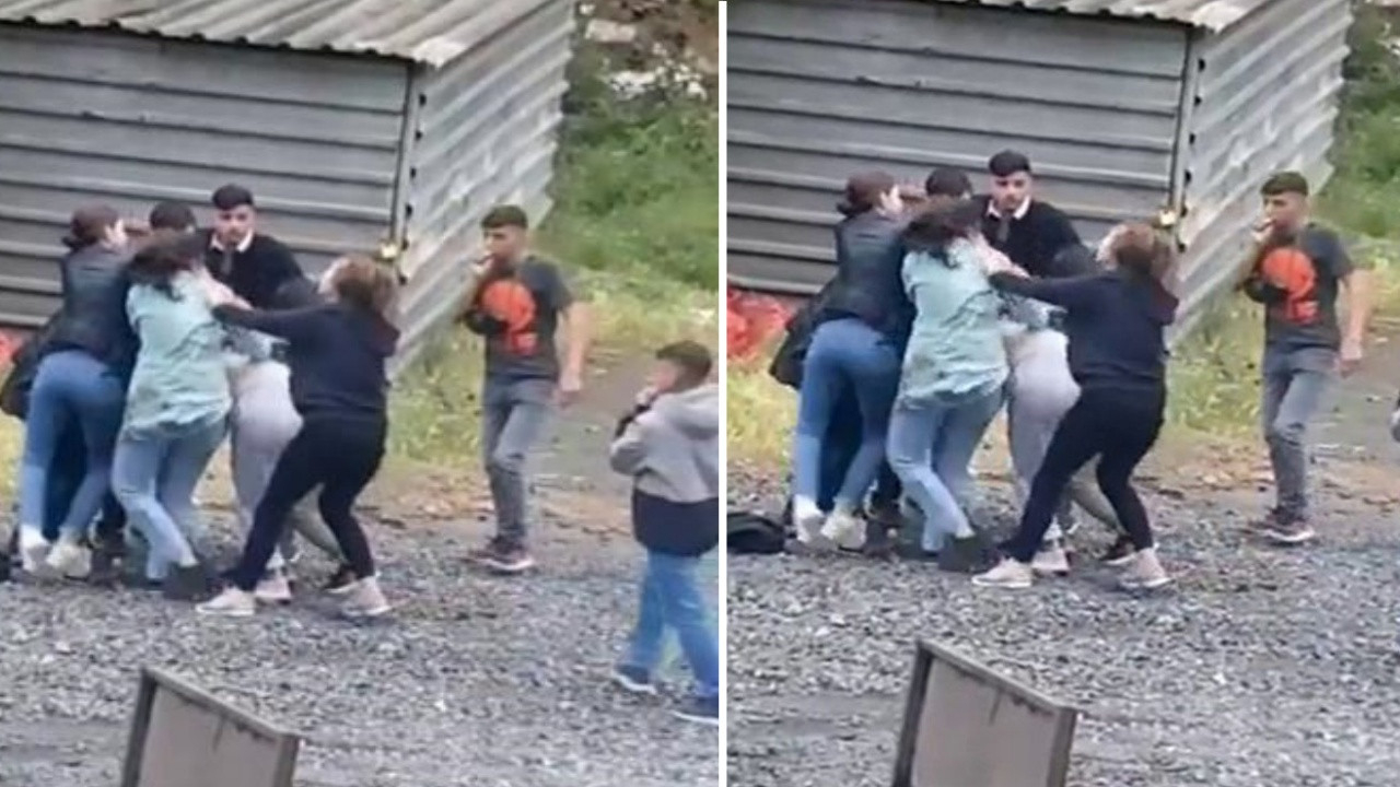 Genç kızlar sokak ortasında tekme tokat birbirine girdi!
