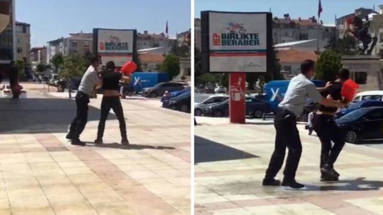 Belediye önünde hareketli dakikalar! Benzin döküp kendini yakmaya kalkıştı...