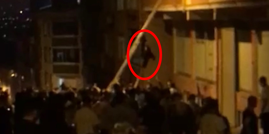 Alevleri görünce panikledi! Balkondan aşağı atladı