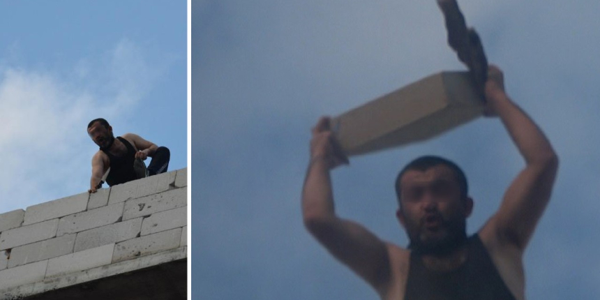 İntihara teşebbüs eden şahıs kendisini kurtarmaya gelen itfaiye ekiplerine taş attı