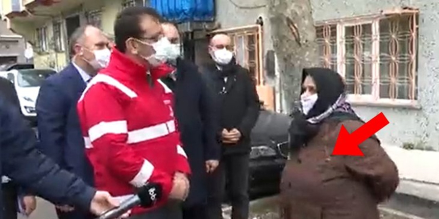 İmamoğlu'na sevgi gösterisinde bulunan kadının yakasında mikrofon unutuldu!