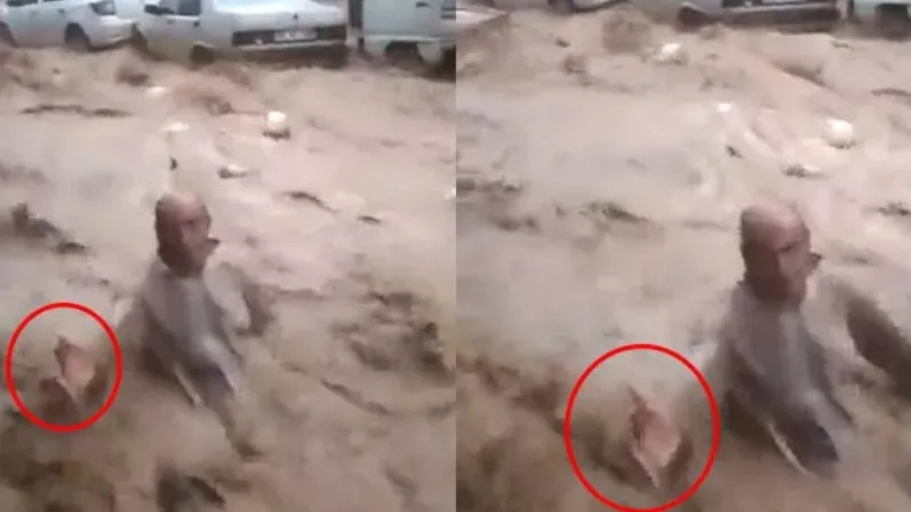 İnsanlık ölmüş! Sele kapılan adam elini uzattı, tutmak yerine video çekti!