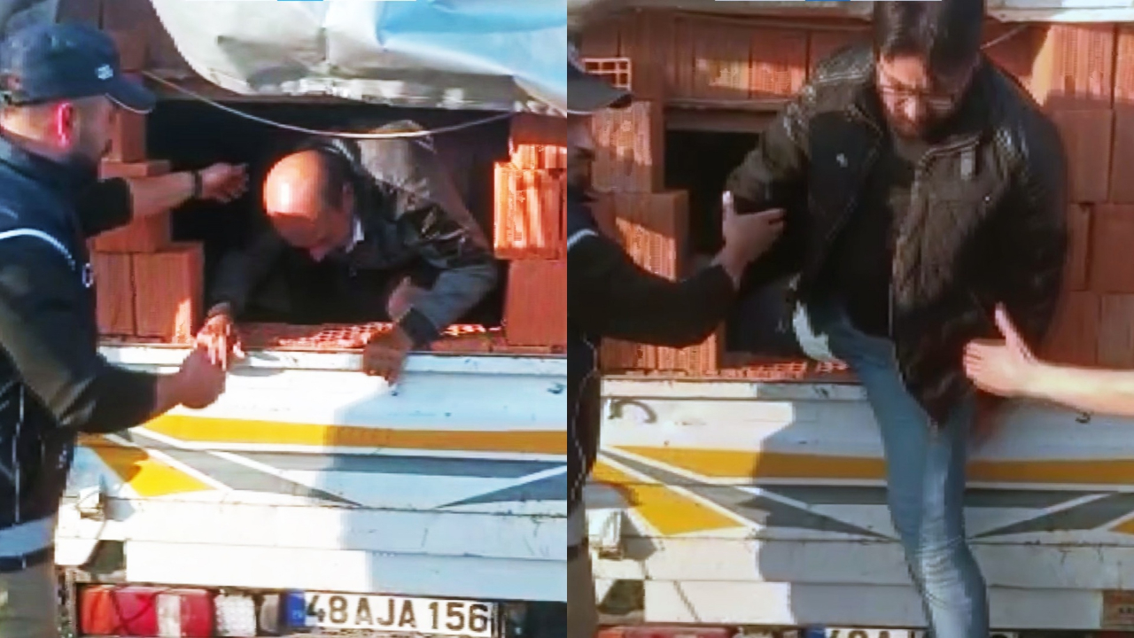Tuğlaların arasından göçmen çıktı! Kamuflaj kurtaramadı...