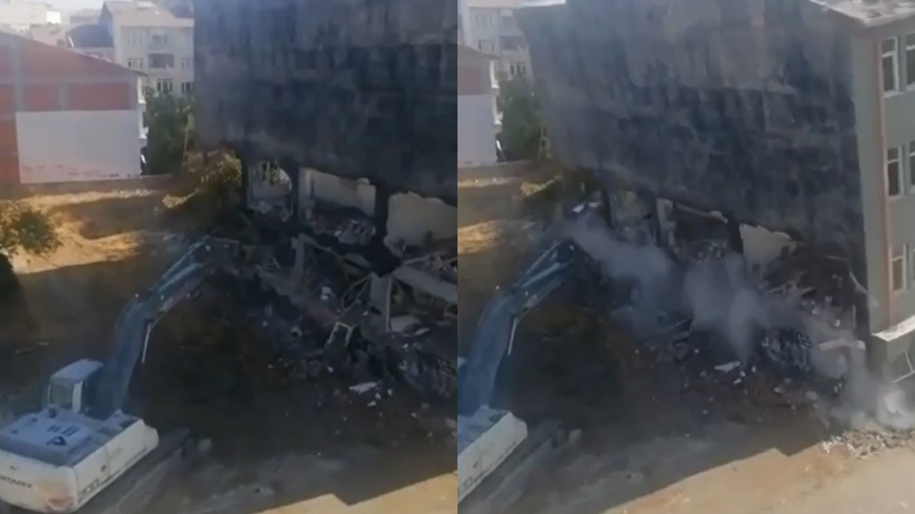 Malatya'da ağır hasarlı bina kepçenin üzerine çöktü!