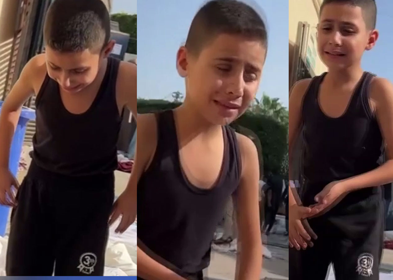 Gazzeli küçük çocuk Khaled cenazeler arasında ailesini aradı