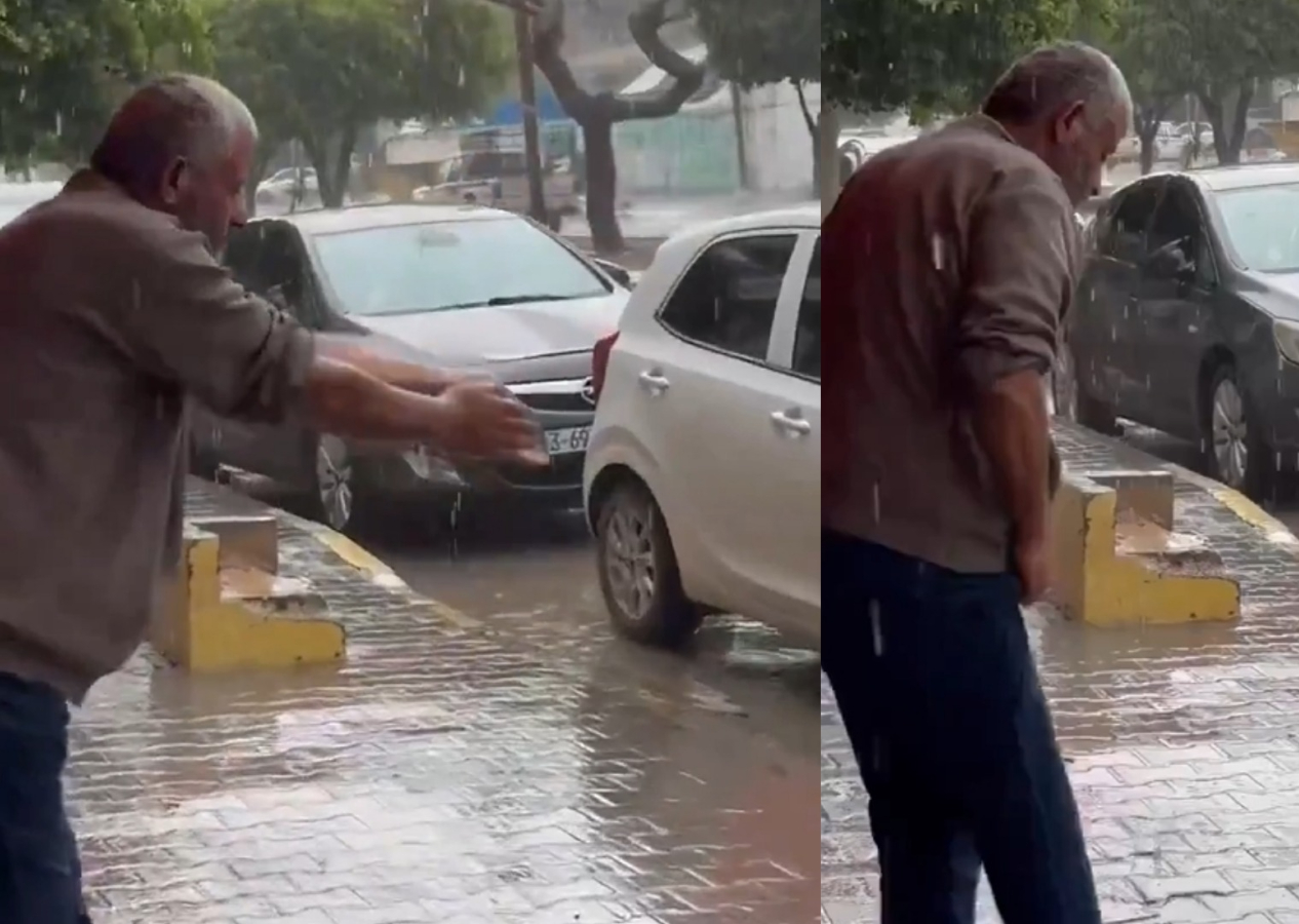 Suya ulaşımın imkansız hale geldiği Gazze'de bir Filistinli yağmur suyuyla abdest aldı