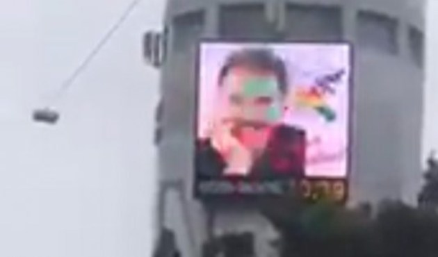 Teröristbaşı Öcalan'ın resmini reklam panosuna yansıttılar...