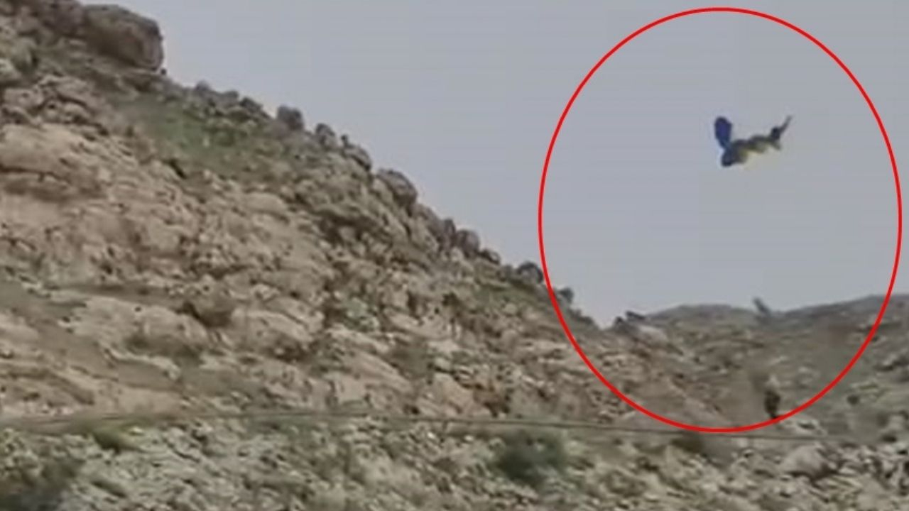 Paraşütçünün zor anları! Ters rüzgara kapılıp düştü