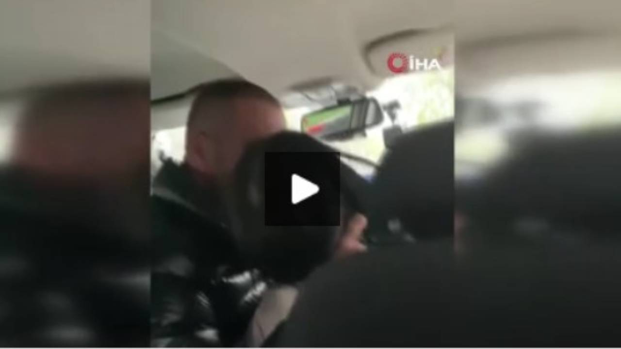 Taksici, ön koltukta oturan kadına tokat atarak saçını çekti