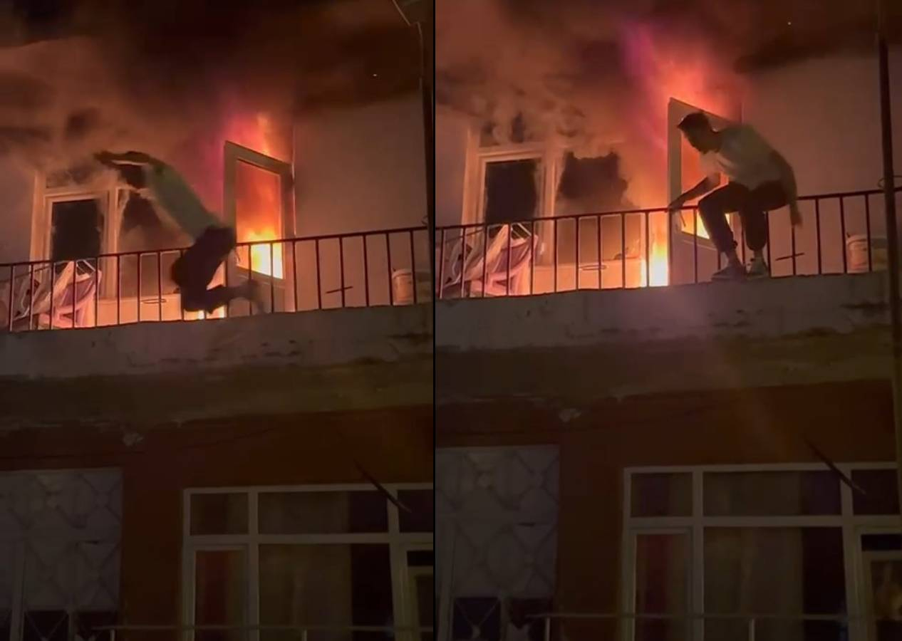 Komşuda çıkan yangına müdahale edeyim derken balkondan atlamak zorunda kaldı