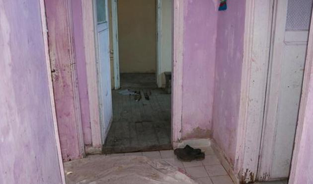 Karısının gözü önünde domuz bağıyla öldürdüler