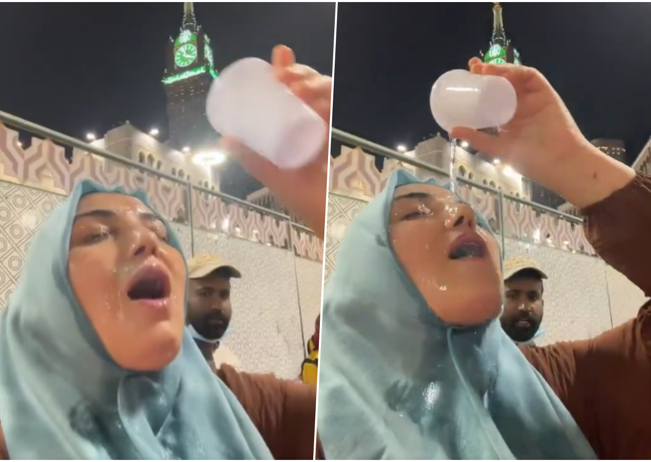 Umre'de zemzem suyunu yüzüne dökerek video paylaşan kadına tepki yağdı! Arkadaki adamın bakışları her şeyi özetliyor