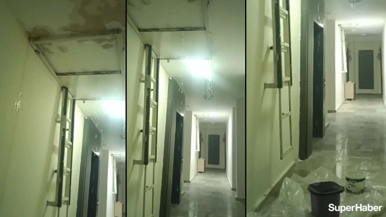 Deprem konutlarında bazı binalarda su baskını! Kovalar yetmedi
